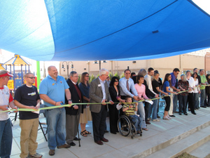 Dr. Elchahal cutting ribbon